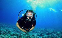 A woman scuba diving