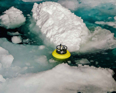 A SWIFT drifter developed by University of Washington researcher Jim Thomson is deployed during the 2018 SODA cruise to the Arctic Ocean.