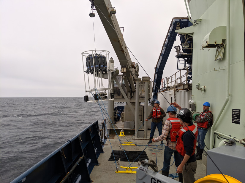 Scientists recovering Atlantis' main CTD rosette to gather measurements such as temperature, salinity, nutrients, and chlorophyll during the cruise. Photo: Robert Lampe.