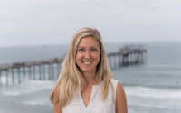 Profile photo of a woman near the beach