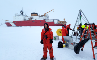 Layman helping to set up an on-ice science station in the Arctic Ocean at 81 degrees north.