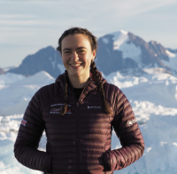 Bryony Freer in front of snowy Greenland landscape