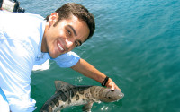 Dr. Andy Nosal holds a leopard shark