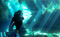Mariela Rios scuba diving in the ocean