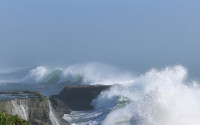 Large storm waves crashing on the rocks near Santa Cruz, California
