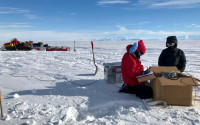 Chloe Gustafson and mountaineer Meghan Seifert installing a magnetotelluric station in Antarctica. Photo: Kerry Key, Columbia University. 