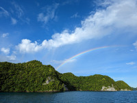 Photo of a rainbow over an island