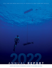 Diver under boat in blue ocean for IGPP annual report cover for 2022.