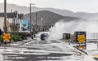 Storm waves lash city streets in Pacifica, California 