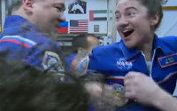 Jessica Meir greeted on arrival at the International Space Station.