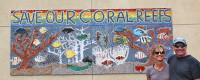 Tim Lueker with wife Chris next to the â€œSave Our Coral Reefsâ€ mosaic in Encinitas, Calif. 
