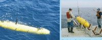 An AUV in the ocean and two men and the AUV. 