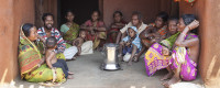 Indian family with clean-burning cookstove. Photo: Tanvi Mishra
