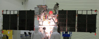 Workers conduct a light test on the solar arrays on DSCOVR. Photo: NASA/Ben Smegelsky