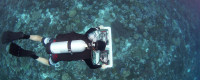 Gareth Williams surveys reefs at Palmyra Atoll