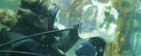 Artist Wayne Martin Belger lines up a shot with his underwater pinhole camera inside Birch Aquariumâ€™s kelp forest tank.