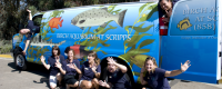: Birch Aquarium at Scripps educators celebrate their new outreach van.