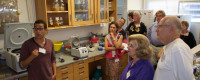 A group of people tour a lab.