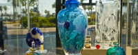 Nancy Arthur-McGeheeâ€™s glasswork on display at the San Diego International Airport features etchings of marine life and birds.