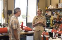 Scripps scientist Dan Rudnick leads Rear Admiral Nancy Hann on a tour of the Underwater Glider Laboratory at Scripps.