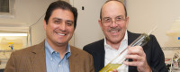 State Senator Ben Hueso and Dominick Mendola in the Scripps algal biofuel laboratory.