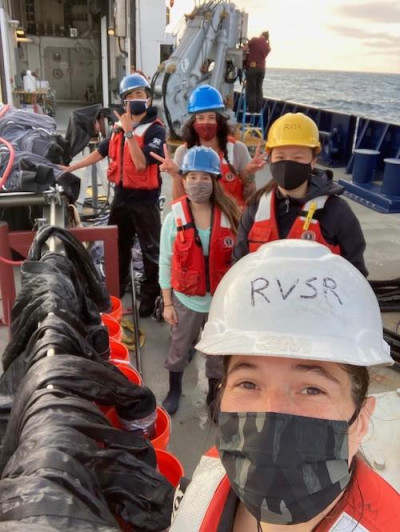 Rachel Chen (yellow helmet) on a research cruise on R/V Sally Ride with the Choy Lab