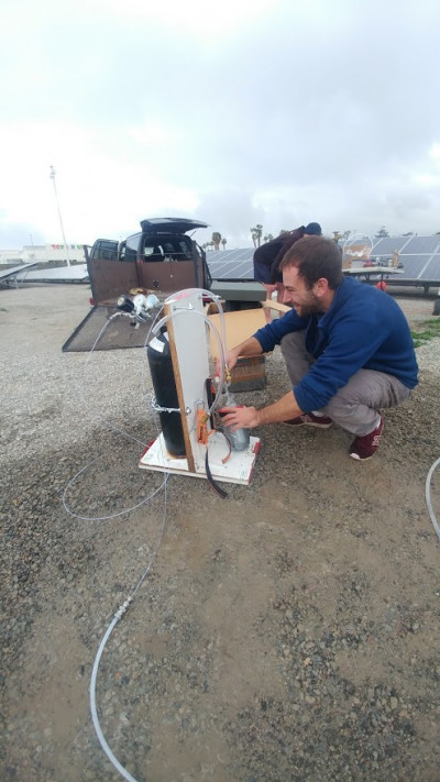 Then-Scripps Oceanography graduate student Alan Seltzer collects a deep groundwater sample from a well in Chula Vista, Calif. in 2018. By measuring the dissolved noble gas composition of groundwater in the San Diego region, he and colleagues found that mean surface temperatures were roughly 7°C colder than present day during the Last Glacial Maximum 20,000 years ago. (Photo: Justin Kulongoski)  