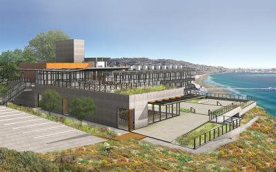 A rendering of a modern building up on a hill with the ocean and a pier visible in the background.