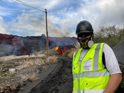 James Day in safety gear near the erupting volcano on La Palma.