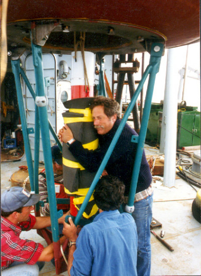 Russ Davis with toroidal float and Doppler profiler, R/V Melville, early 1990s