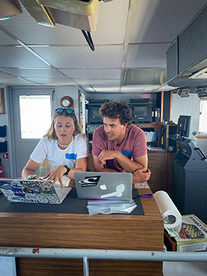 Author Kerstin Bergentz and fellow Scripps graduate student Devon Northcott aboard the bridge of R/V Point Sur trying out being chief scientists. Photo: Jen MacKinnon