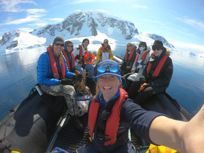 Allison Cusick leads a group of citizen scientists to collect phytoplankton samples from glacier meltwater. Photo: Allison Cusick