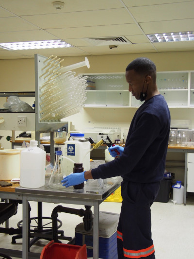 Dr. Mosimanegape Jongman in the lab