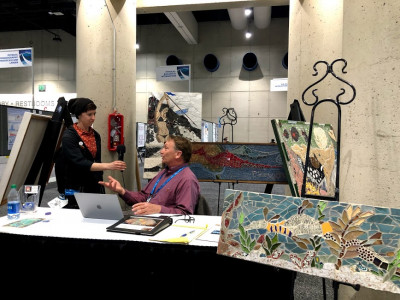 As a featured artist being interviewed while displaying mosaics at the Ocean Science Meeting in San Diego (2020)