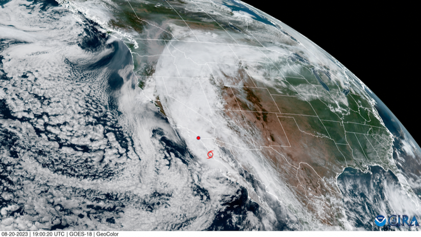 A GOES-18 RGB (Red-Green-Blue) composite satellite image of Tropical Storm Hilary on August 20, 2023, shows the cyclone’s center a few hundred kilometers south of the EPCAPE deployment, noted by a red marker.