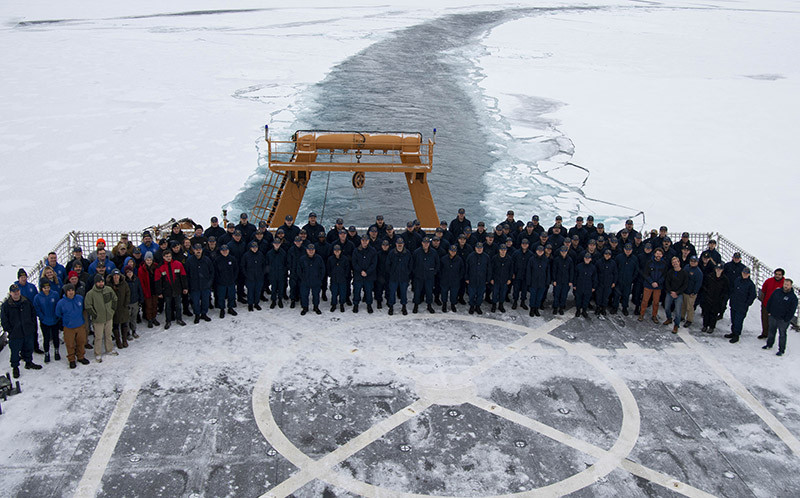 a group of researchers onboard an icebreaker
