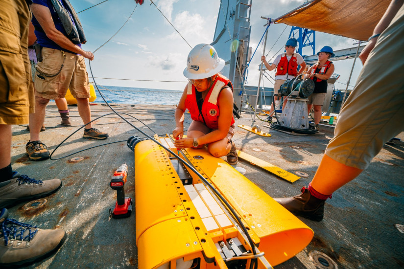 MOD lab engineer Isabella Franco is getting the DelMar Ocean Wirewalker ready for deployment.