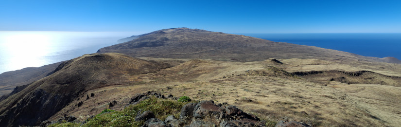 Looking north along the axis of Guadalupe Island from its second-highest peak, Monte Ester (992 meters or 3,255 feet above sea level), towards its highest peak, Monte Augusta (1,281 meters or 4,203 feet above sea level). Small, pointy hills are scoria cones, which are among the youngest volcanic features on the island.