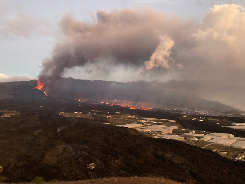 The eruption plume of the 2021 La Palma eruption looms above El Paso, La Palma, Canary Islands.