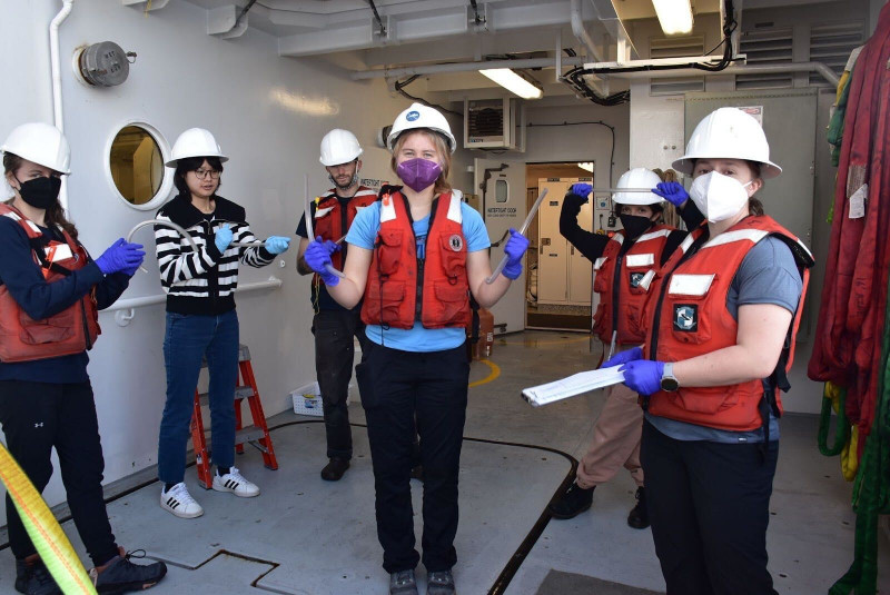 Dr. Kaycie Lanpher,  Pierina Erazo, Emmet Norris, Linqing Huang, Ruth Verner, and Shannon Perry prepare to collect water from the CTD.