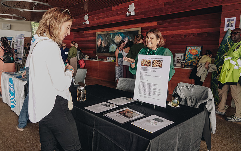 Heather Ponchetti Daly (right), tribal member of the Iipay Nation of Santa Ysabel and adjunct professor at UC San Diego, speaks about her work on Indigenous foodways, recipes, and approaches to climate change. Photo: Kelly Tseng