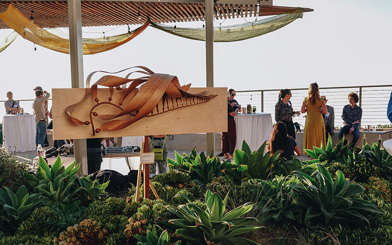 Giant kelp wood carving by artist Chance Coalter welcomed guests to the event. Photo: Kelly Tseng