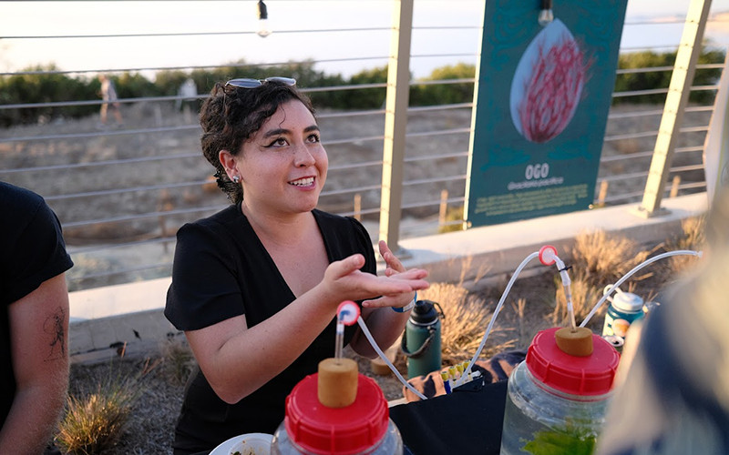 Kalani Ortiz, staff researcher for the Smith Lab, shares information on the seaweeds they are cultivating for culinary uses at Scripps Oceanography. Photo: ResilienSEA (Captured by Justin Dressel)