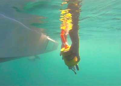 Scripps researchers deploy an underwater robot. 