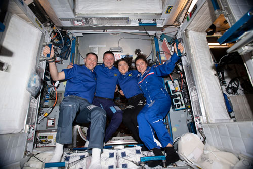 NASA astronauts Nick Hague, Andrew Morgan, Christina Koch and Jessica Meir, all members of the Astronaut Class of 2013, pose for a portrait aboard the International Space Station. Photo: NASA