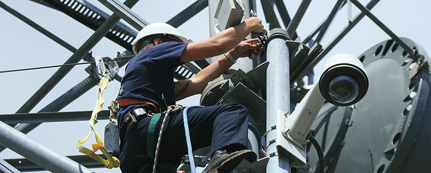 Antenna installation on a microwave tower to connect a nearby fire station to HPWREN. Courtesy of HPWREN/SDSC
