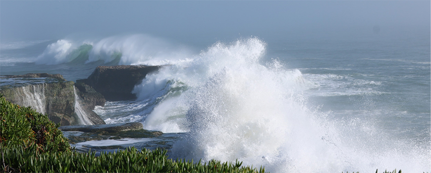 Large storm waves crashing on the rocks near Santa Cruz, Calif. Photo: Christine Hegermiller/U.S. Geological Survey